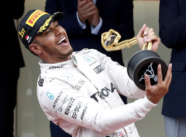 Jubilant Hamilton celebrates after rain-soaked Monaco GP win
