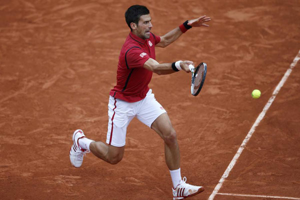 Djokovic wraps up long victory, Murray plays Wawrinka in semis at Roland Garros