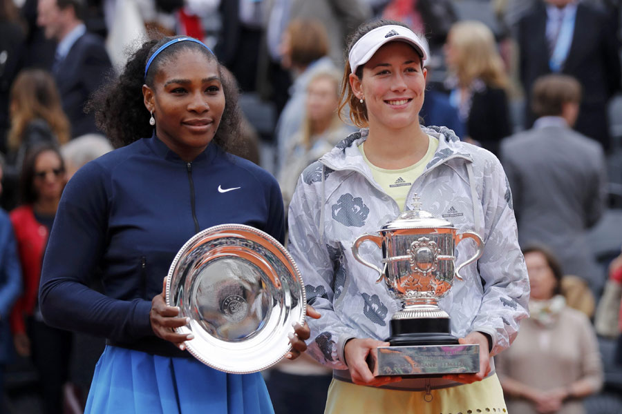 Muguruza stuns Serena to win French Open