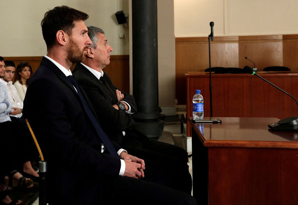 Barcelona's Messi gets 21 months for tax fraud