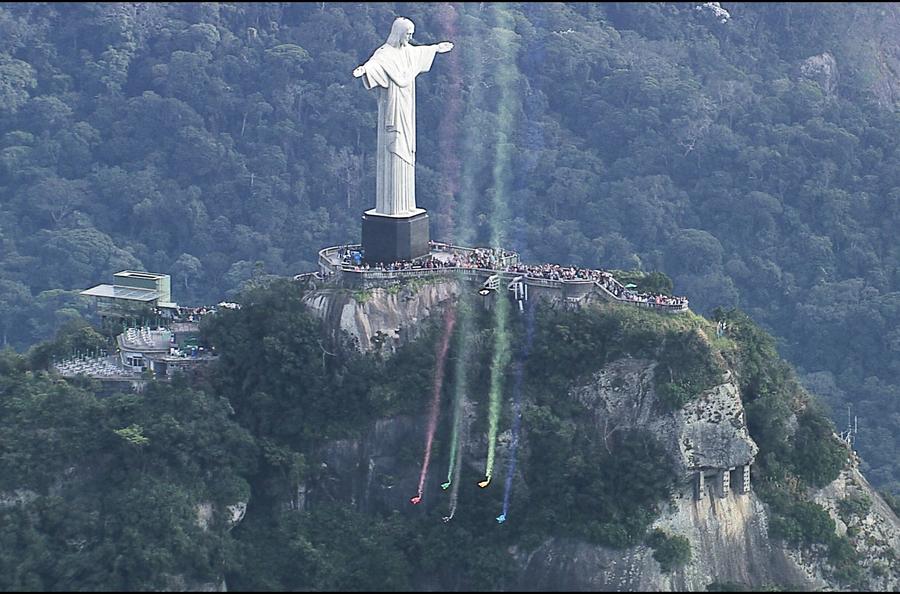 Wingsuit flyers soar over Christ the Redeemer statue