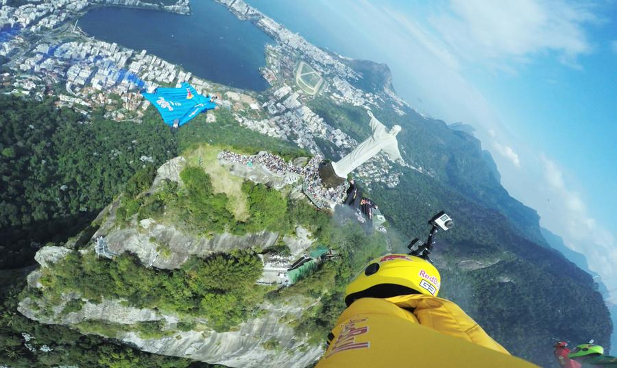 Wingsuit flyers soar over Christ the Redeemer statue