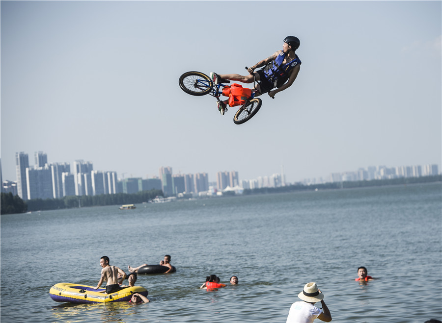 Perfect shot in Wuhan: BMX riders in the air