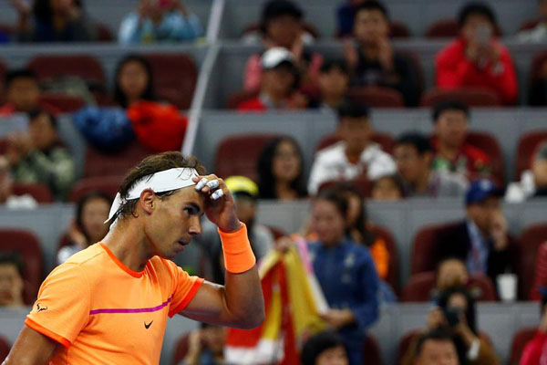 Murray and Nadal ease into second round of China Open