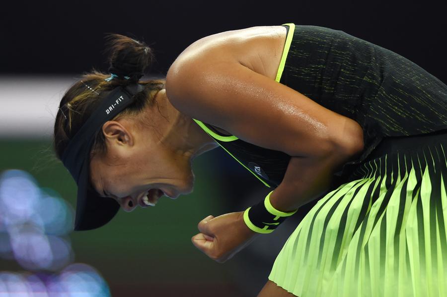 China's Zhang Shuai wins tiebreaker to enter third round