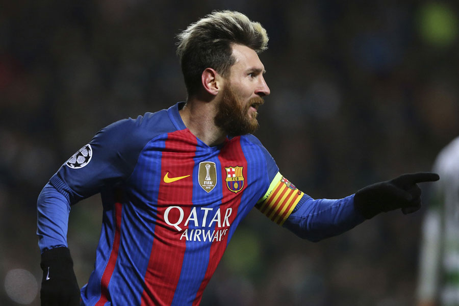 Messi double guides Barcelona to 2-0 win at Celtic