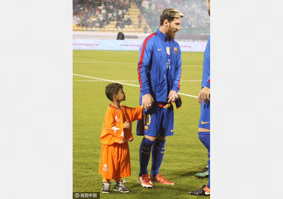 Messi meets Afghan boy famed for plastic bag shirt