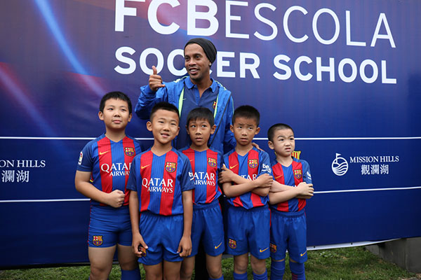 Ronaldinho, Barca boost China's grand ambitions