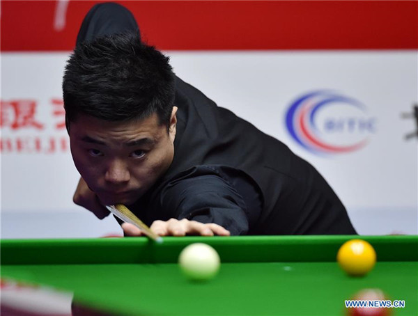 Ding Junhui, Judd Trump win at World Snooker China Open