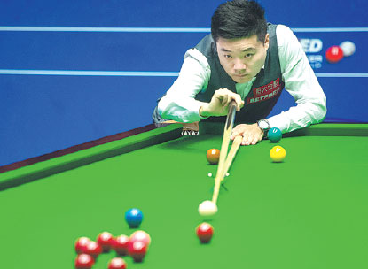 Ding cashes in after Ronnie's maximum miss
