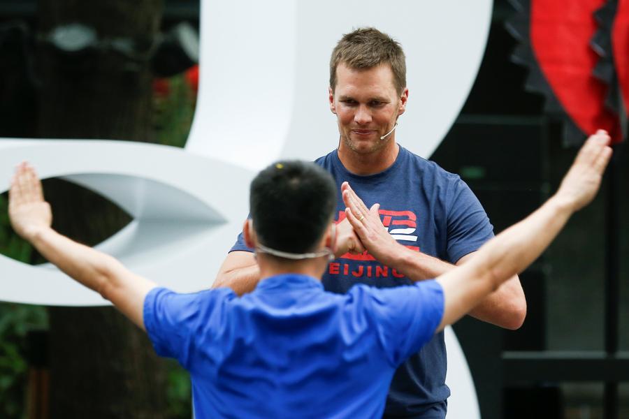 NFL star Tom Brady 'dreams' of playing football game in China