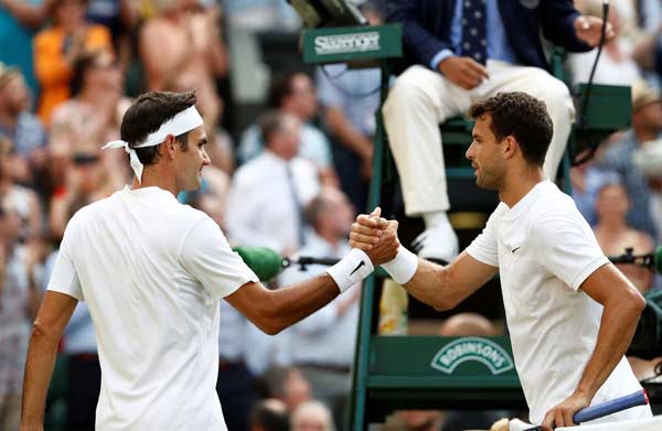 Federer and Murray reach Wimbledon quarterfinals