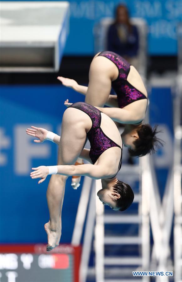 Chinese divers add two synchronized gold medals at the worlds