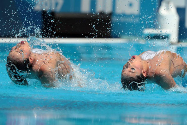 China's synchronized swimming sisters return to claim silver