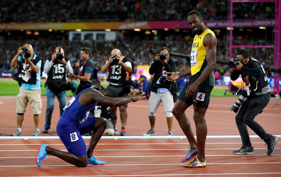 Gatlin stuns Bolt to win 100m world title, Su finishes 8th
