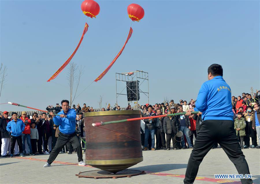 Competitors whip 2,000 kilograms top at top ga