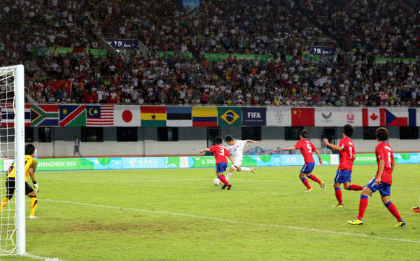 China reach last eight after scoreless stalemate