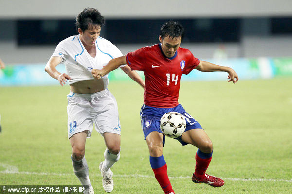 China reach last eight after scoreless stalemate