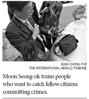 On patrol, busybodies with cameras