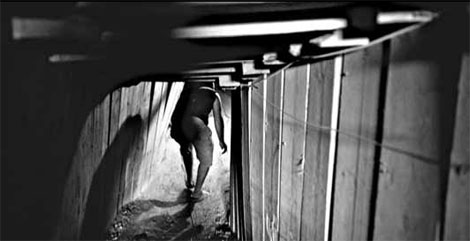 A hunched shuffle into Gaza's tunnel