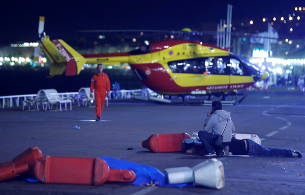 <BR>Live: Truck attack kills over 80 in Nice