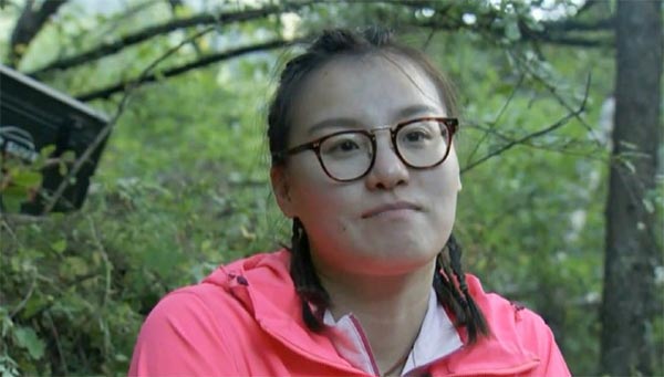 Star swimmer Fu Yuanhui bites snake in Bear's 'Running Wild'