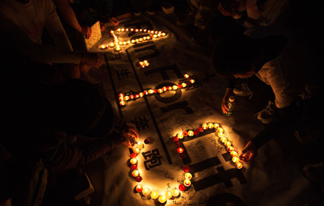 Beijing marathon lovers mourn Boston victims