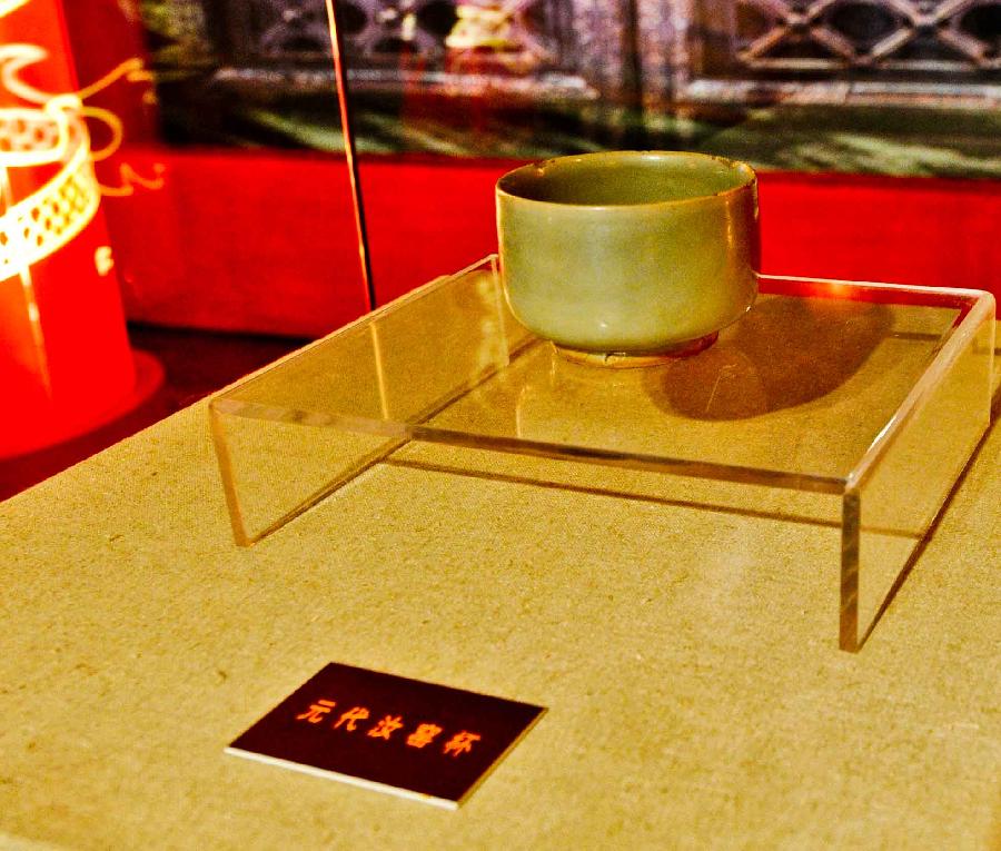 Ancient porcelain cups displayed in Harbin