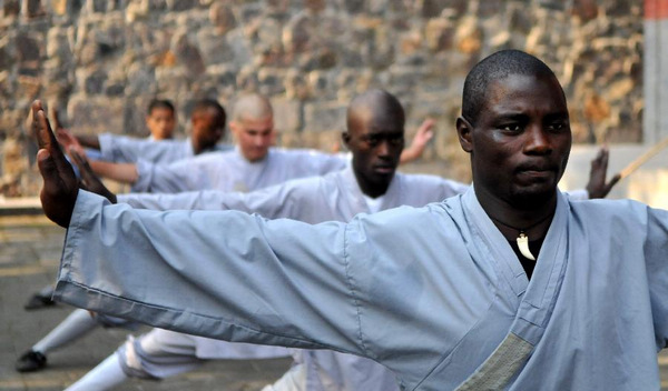 African apprentices practise kungfu at Shaolin Temple