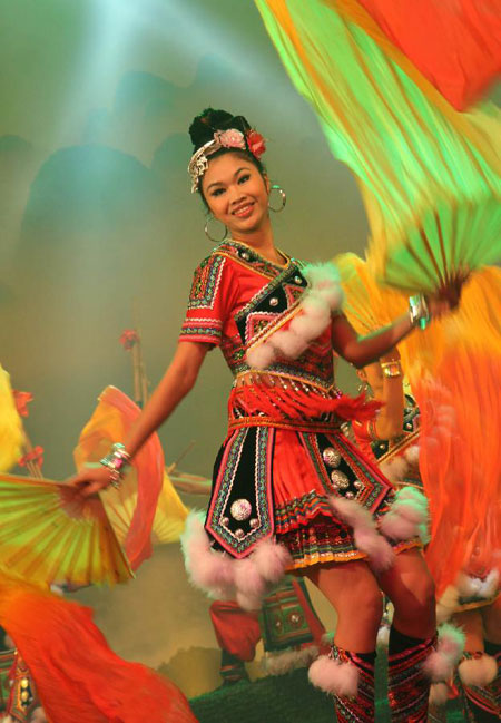 Actors of Miao ethnic group perform dance