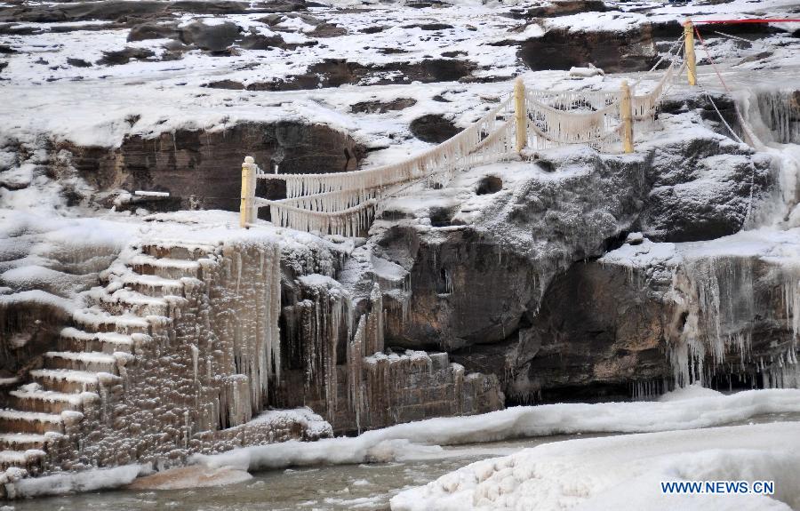 Winter scenery of Hukou Waterfall in N China