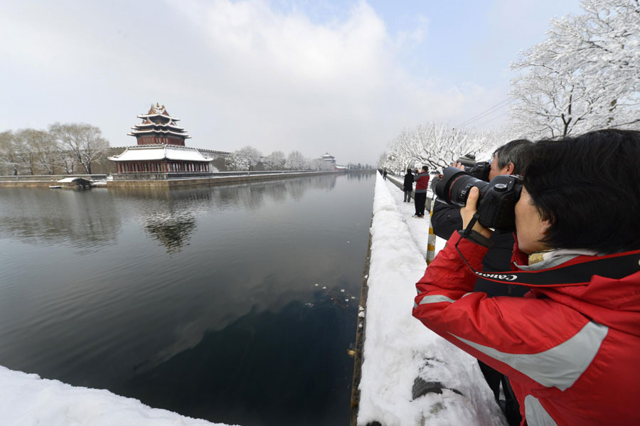 Popular attractions draped in snow