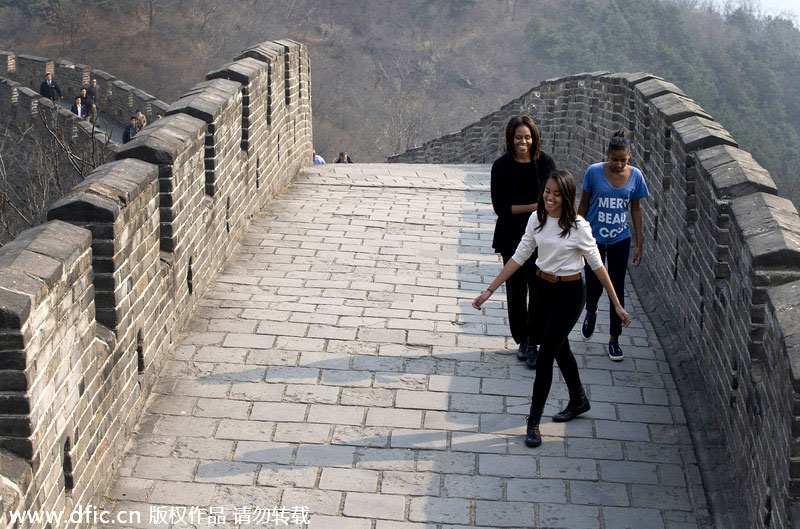 Obamas climb Great Wall after lunch of trout