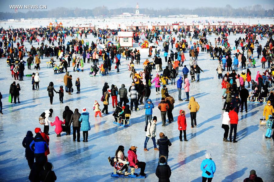 People celebrate New Year on frozen river