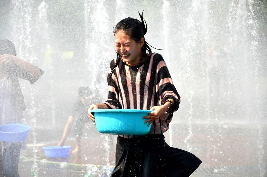 Water-sprinkling festival celebrated by people of Dai ethnic group in SW China