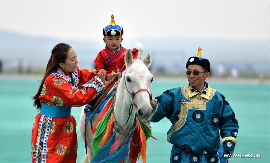 Local herdsmen celebrate traditional festival in Inner Mongolia