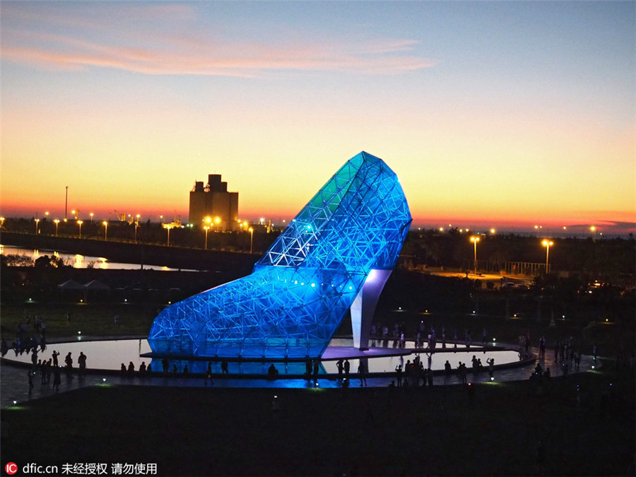 High-heeled glass church opens in Taiwan