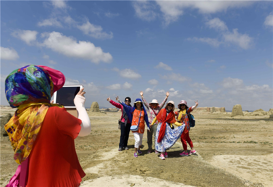 'Ghost city' in Xinjiang desert meets high season