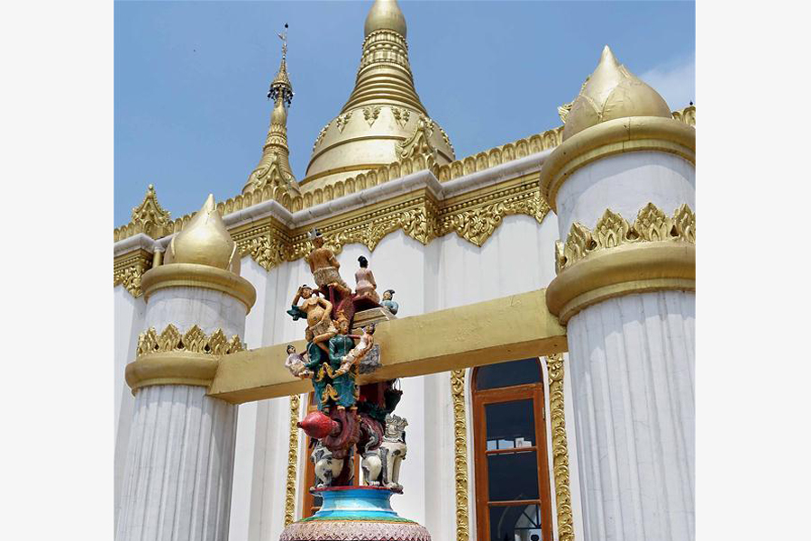 People visit Myanmar style shrine in C China's Henan