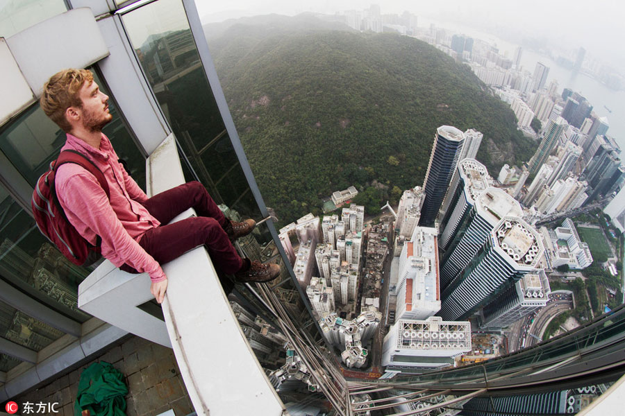 Daredevil thrill-seekers on top of Hong Kong