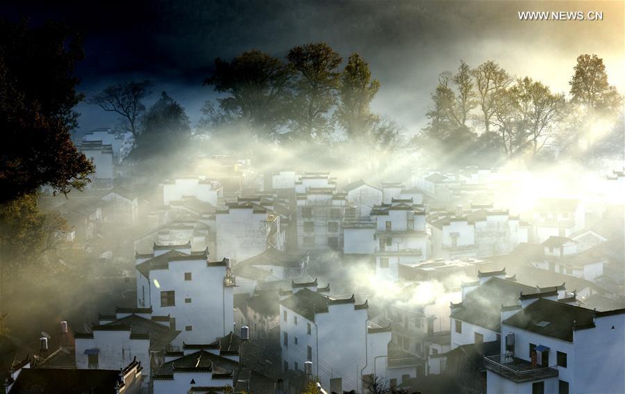 Early morning fog scenery of Shicheng village in East China's Wuyuan