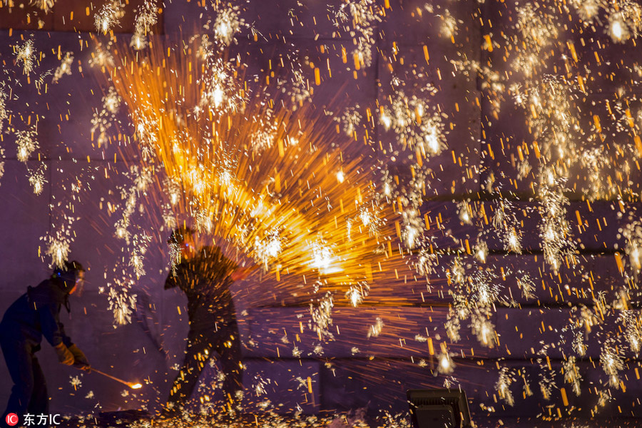 Villagers make sparks in creative celebration of the New Year