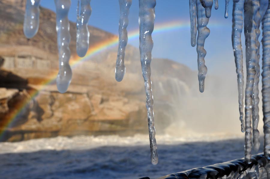 Rainbow arches over Hukou Waterfalls in N China