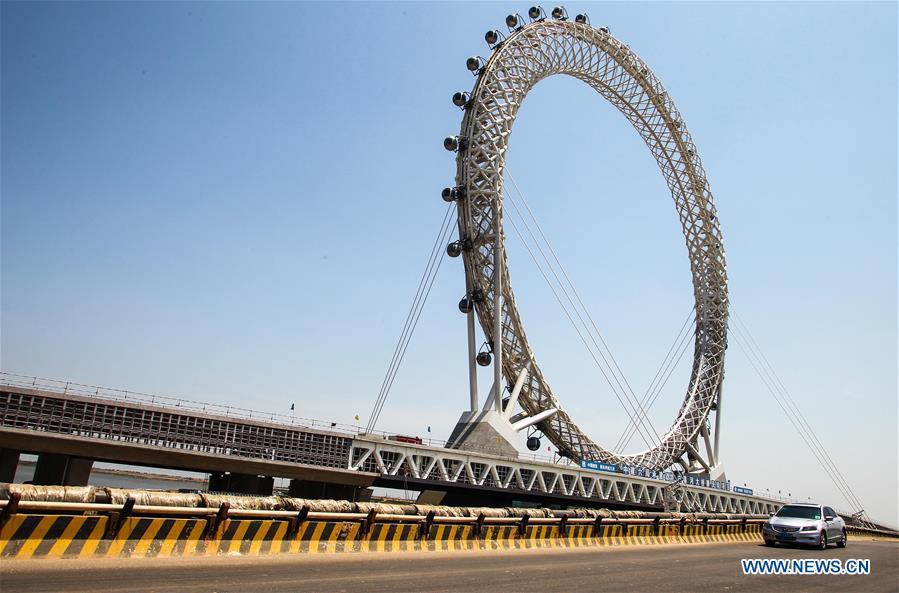 Aerial photo of centerless ferris wheel in E China