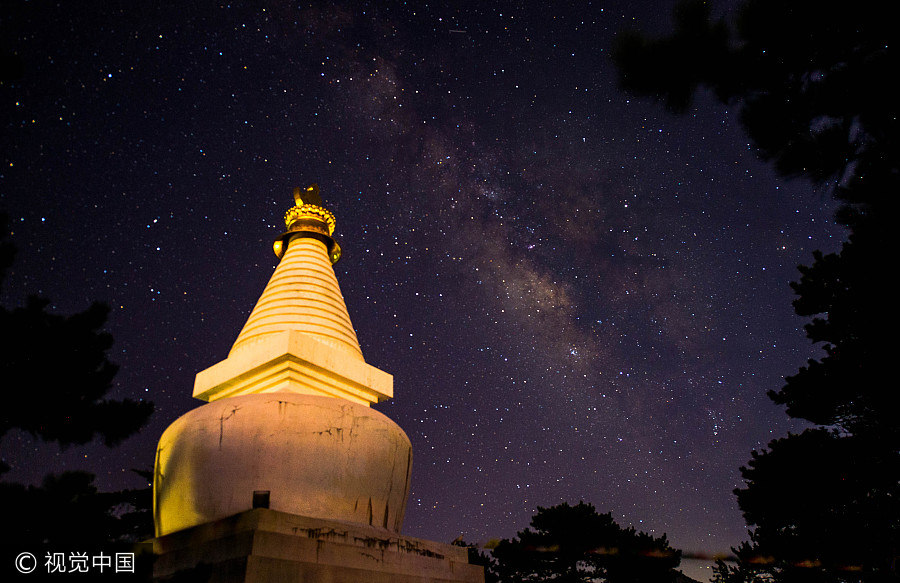 Milky Way illuminates night sky over small town in Jiangxi