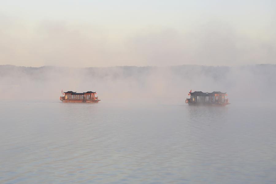 Fog-enveloped Tianquan Lake in Jiangsu