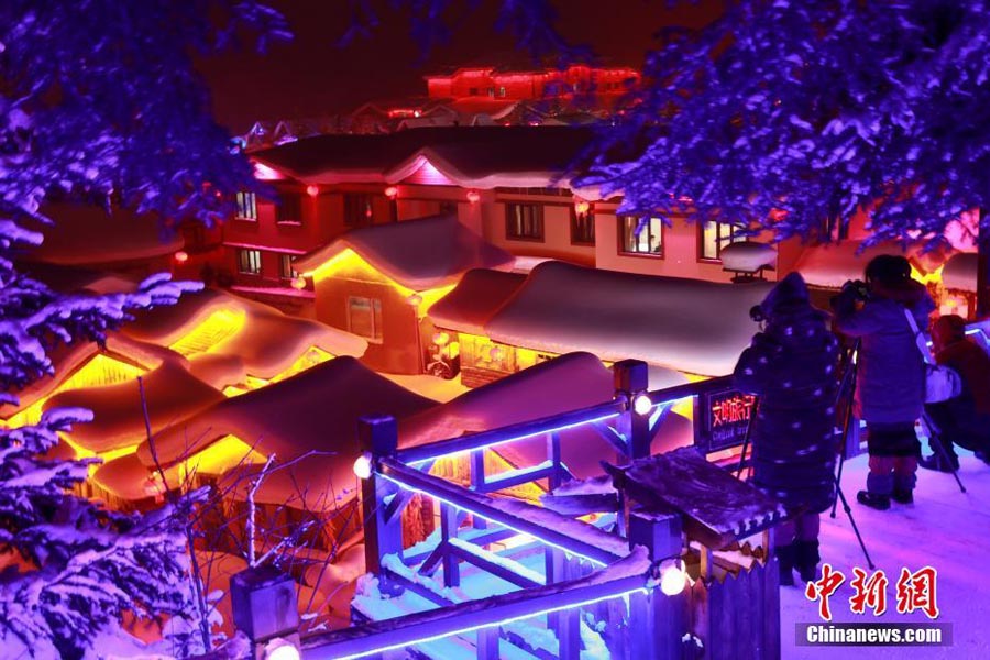 A nighttime winter wonderland in China's snow town