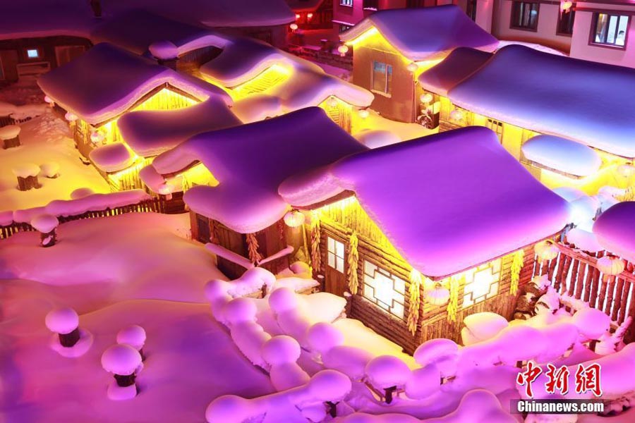A nighttime winter wonderland in China's snow town