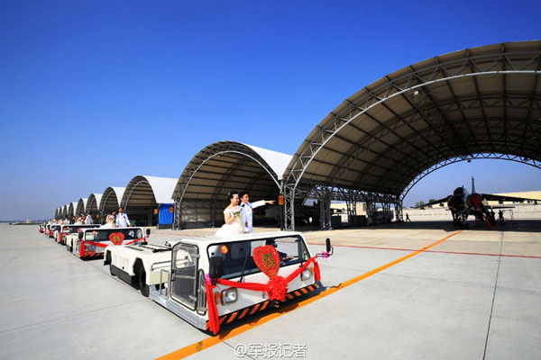 Fighter trailers carry brides to camp