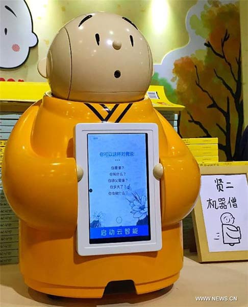 New-age robot offers centuries-old wisdom in Beijing temple